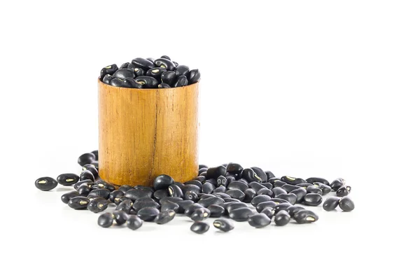 Black beans in wood cup — Stock Photo, Image