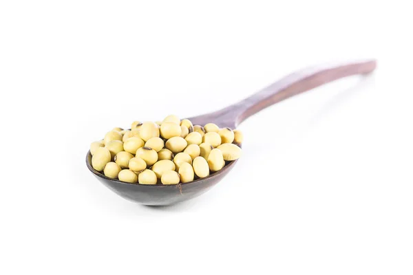 Soybean in wooden spoon — Stock Photo, Image
