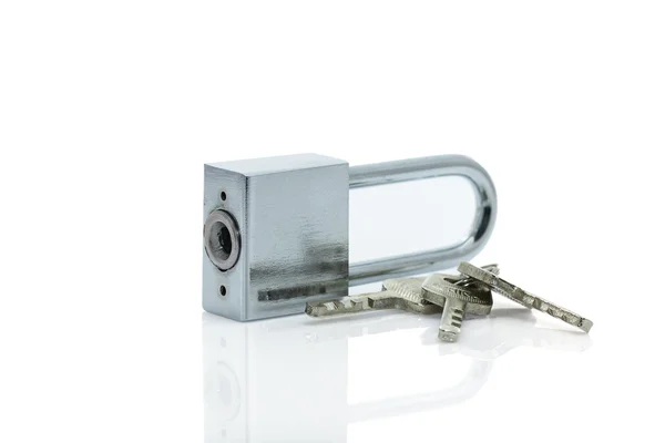 Padlock with three keys on white background — Stock Photo, Image