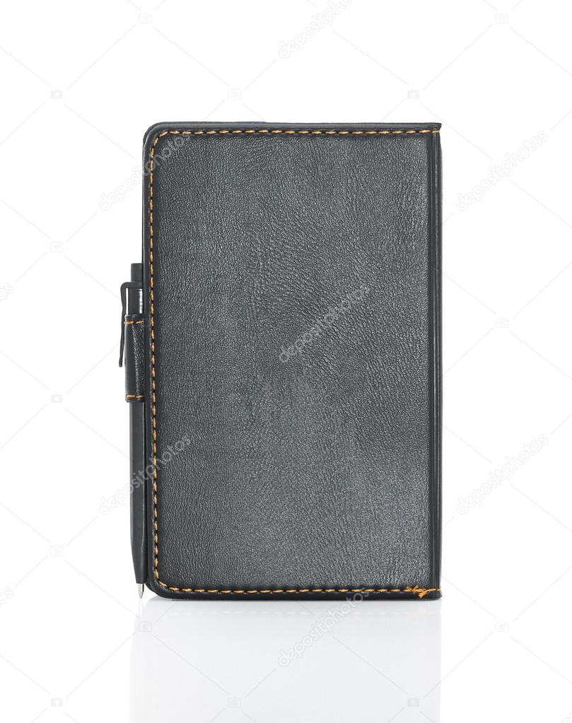 Black leather note book and pen on white 