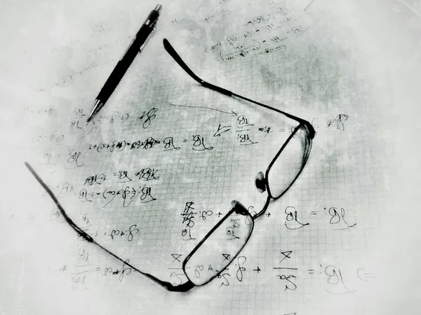 Glasses and propelling pencil on work notes — Stock Photo, Image