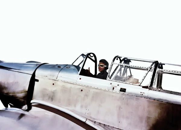 Ww2 pilot, smiling and giving the thumb up in a warbird cockpit — Stock Photo, Image