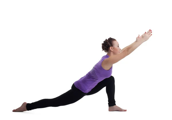 Young woman instructor posing in split isolated — Stock Photo, Image