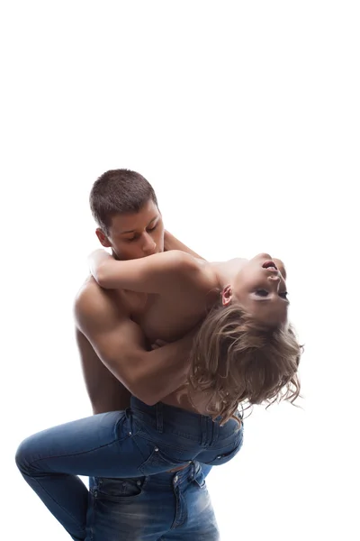 Sexy couple posing kissing in jeans topless — Stock Photo, Image