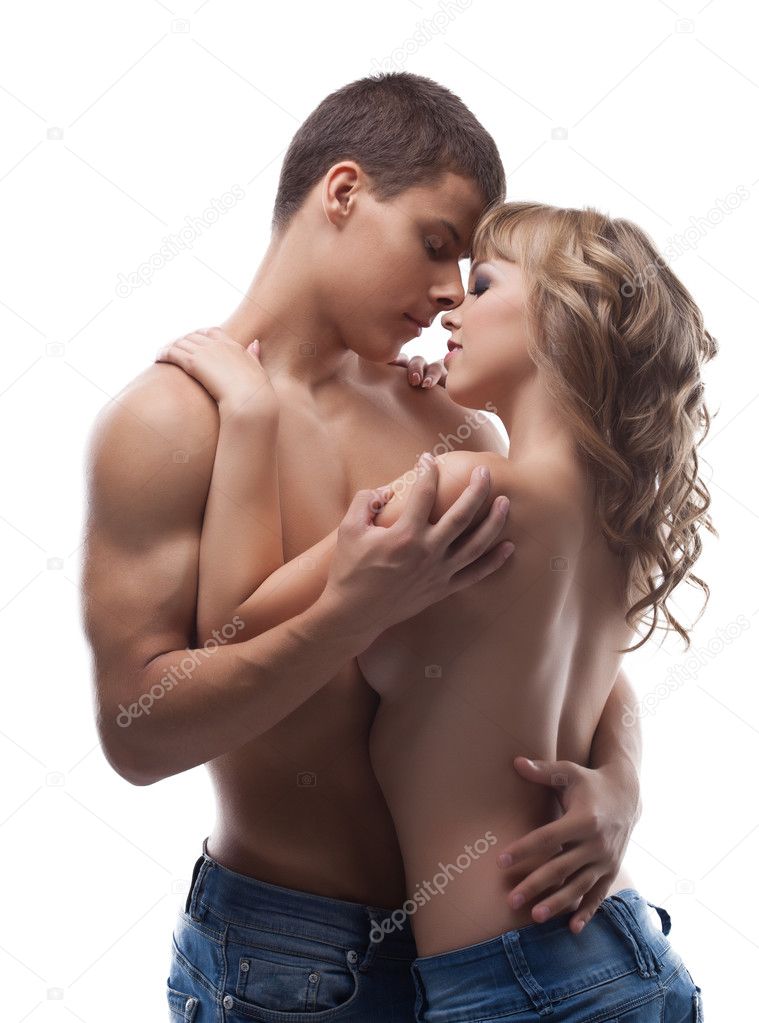 Athletic beauty man kiss sexy girl posing topless