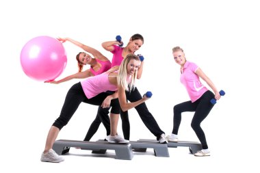 Group of fitness instructors with accesories
