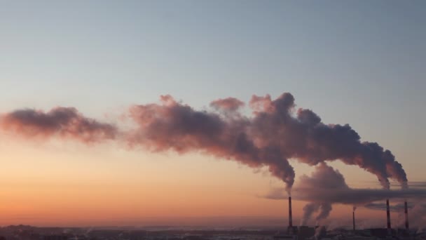 Pipe with smoke in winter sunset time lapse — Stock Video