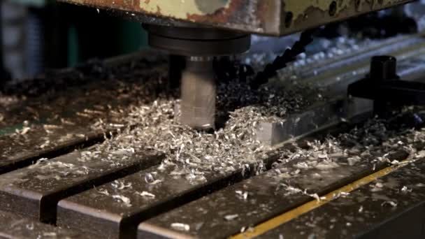 Drill stop cutting metal detail and shavings blow out — Stock Video