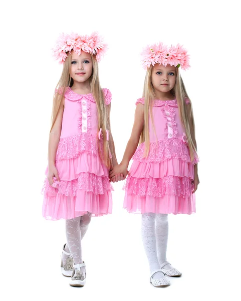 Deux belles petites filles en robes roses — Photo