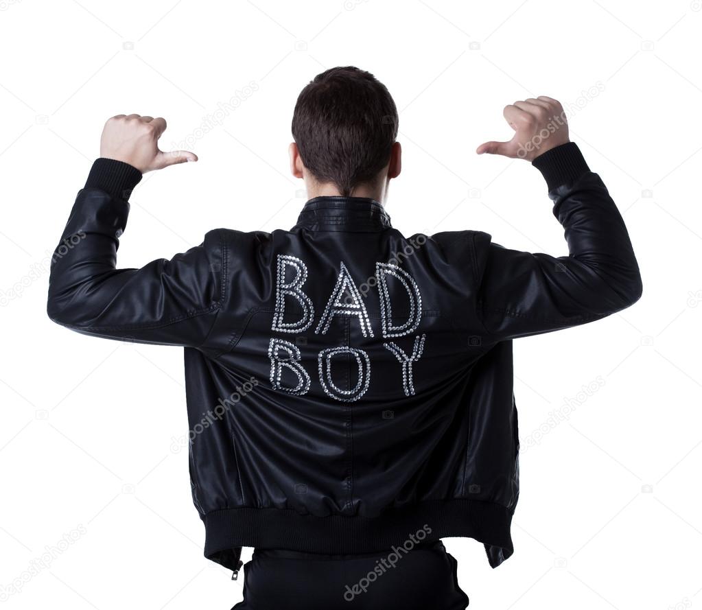 Bad boy porte striptease homme en veste noire image libre de droit par