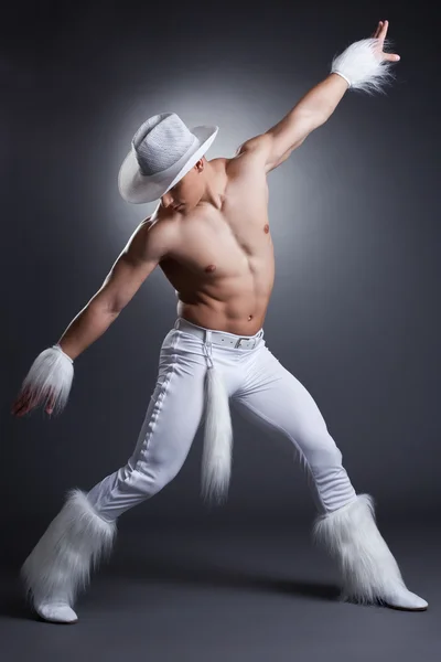 Sexy dancer in cowboy costume — Stock Photo, Image