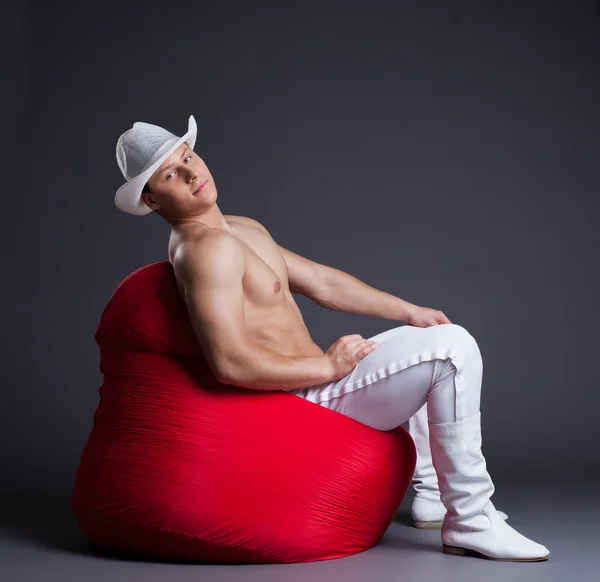 Sexy cowboy in studio — Stock Photo, Image