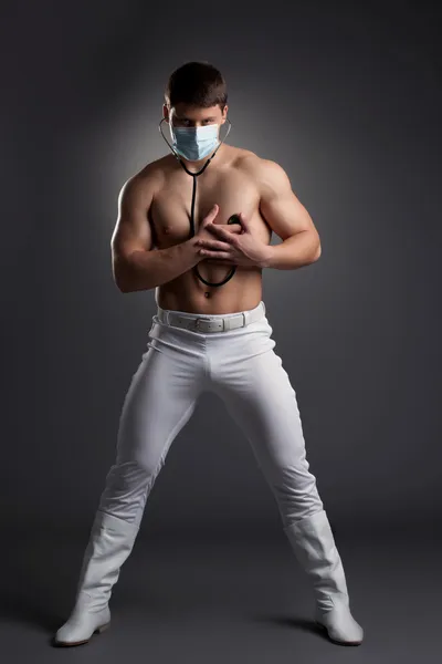 Sexy dancer in white doctor costume — Stock Photo, Image