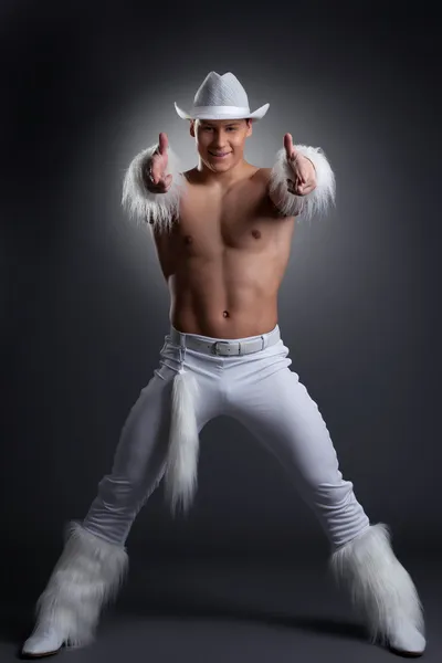 Sexy dancer in white cowboy costume — Stock Photo, Image