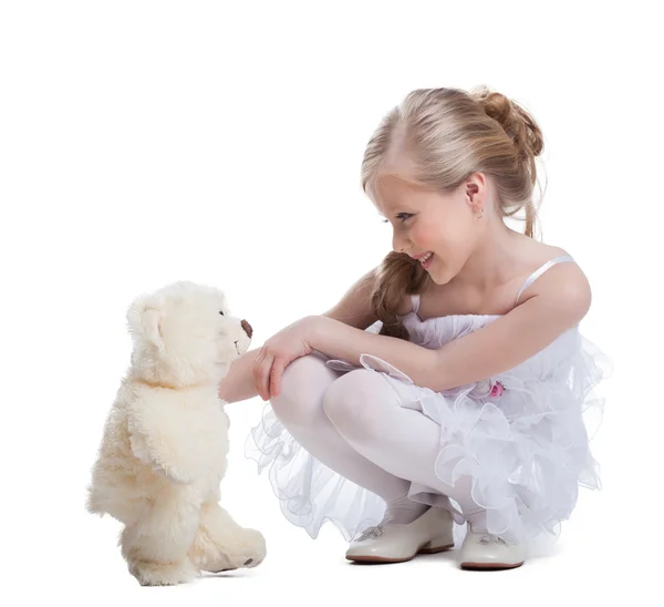 Cute little girl with soft toy — Stock Photo, Image