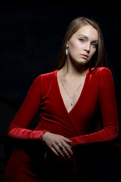 Pretty young woman portrait in red dress — Stock Photo, Image