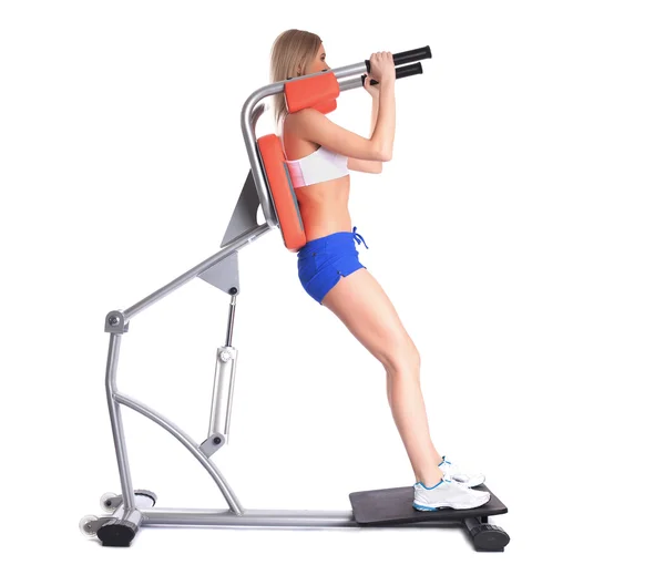 Sporty woman on isodynamic exerciser — Stock Photo, Image