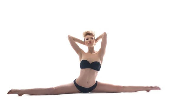 Atletica donna sexy facendo stretching — Foto Stock