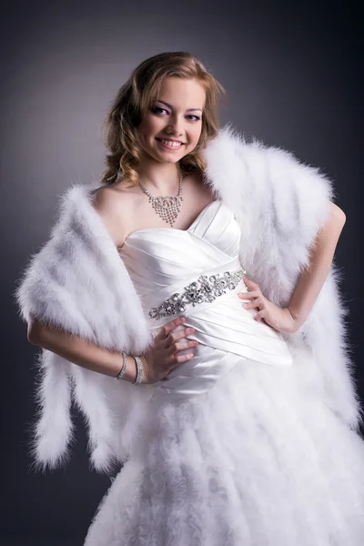 Portrait of smiling bride posing in studio — Stock Photo, Image