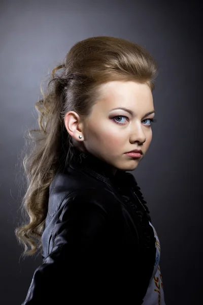 Image of pretty brunette posing in black jacket — Stock Photo, Image