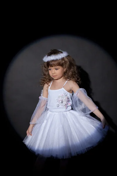 Portrait of adorable angel on dark background — Stock Photo, Image