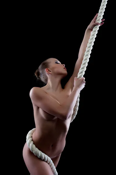 Image of sexy girl posing nude with rope Stock Image