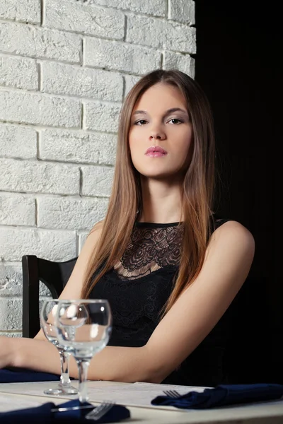 Portrait of sensual young girl posing in cafe — Stock Photo, Image