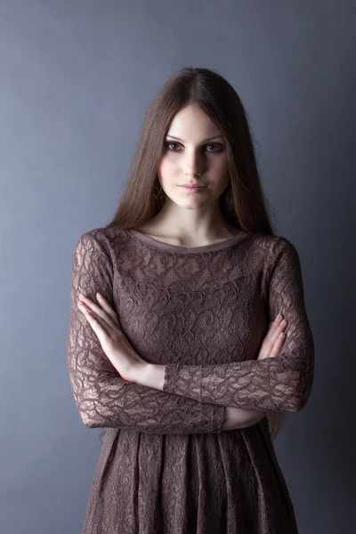 Lovely brunette posing in lace dress, close-up — Stock Photo, Image