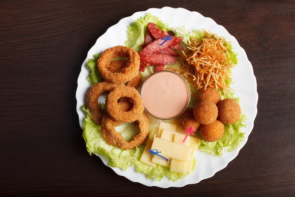 Image of crispy flavored snacks on plate — Stock Photo, Image