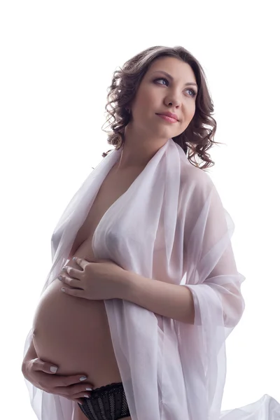 Beautiful pregnant woman in light fabric — Stock Photo, Image