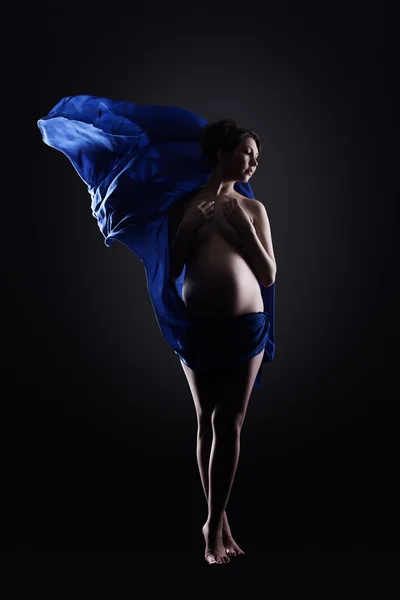 Amazing naked pregnant woman in blue cloth — Stock Photo, Image