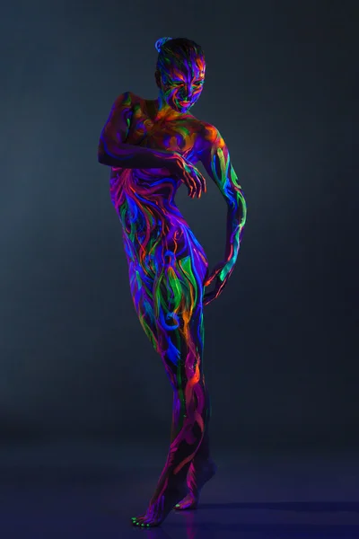 Strange naked woman with UV makeup — Stock Photo, Image