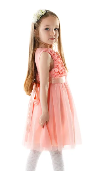 Charming little girl in pink dress and rim — Stock Photo, Image