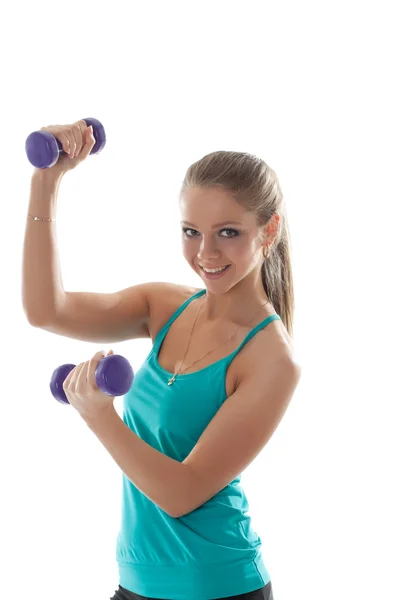 Portrait of cheerful young girl lifts dumbbells — Stock Photo, Image