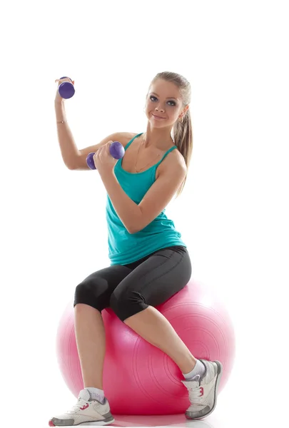 Attractive model posing with sports equipment — Stock Photo, Image