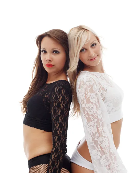 Verführerische sexy Tänzerinnen posieren in Spitzenoutfits — Stockfoto