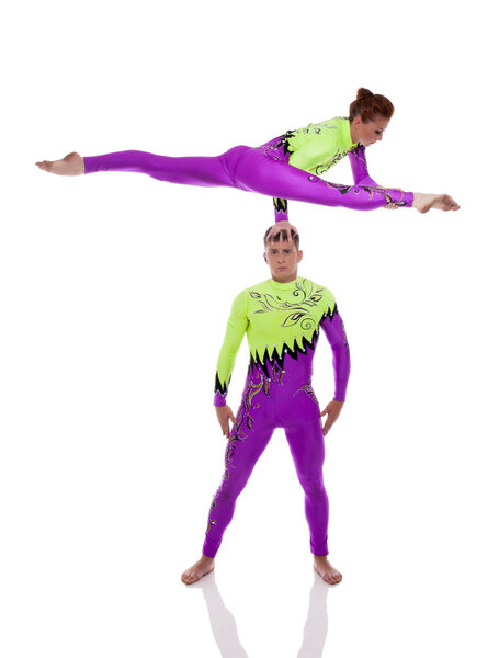 Performance of flexible acrobats in studio