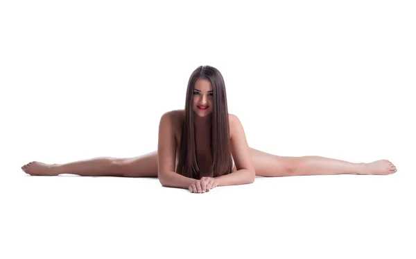 Beautiful smiling brunette posing naked in studio — Stockfoto
