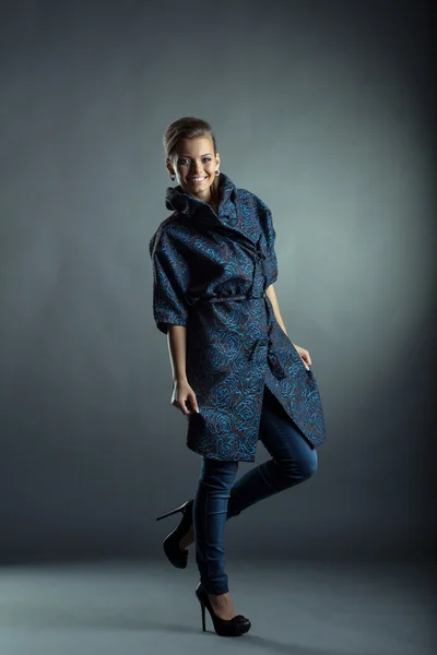 Merry model posing in stylish demi-season clothing — Stock Photo, Image