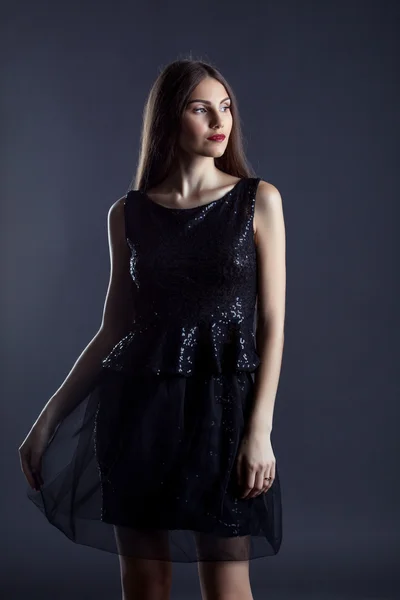 Portrait of beautiful slim model in cocktail dress — Stock Photo, Image