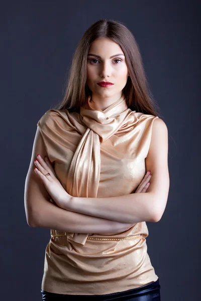 Sexy confident model posing in beige blouse — Stock Photo, Image