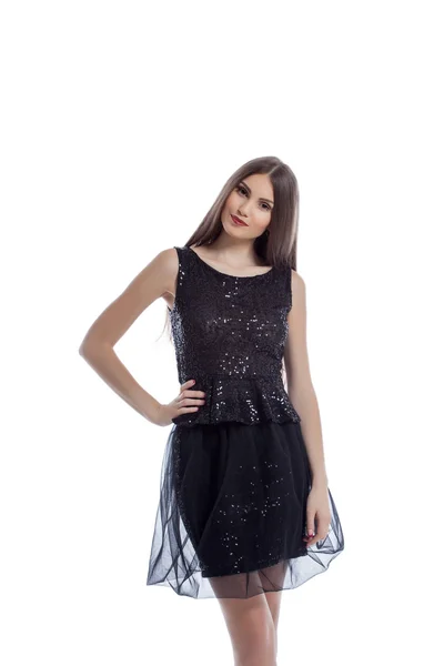 Smiling hot brunette posing in black smart dress — Stock Photo, Image