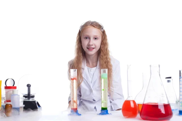 Smiling little experimenter looking at camera — Stock Photo, Image