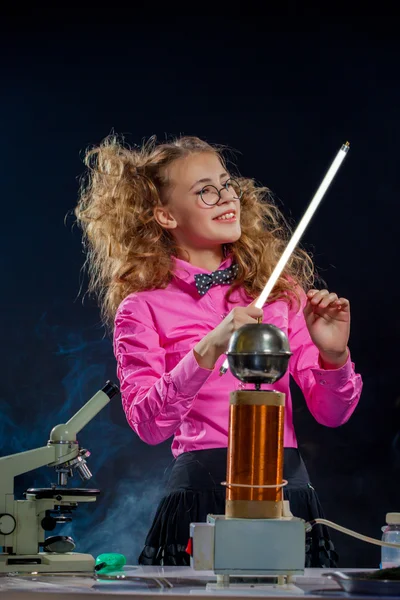 Portrait of adorable schoolgirl posing in lab — Stock Photo, Image