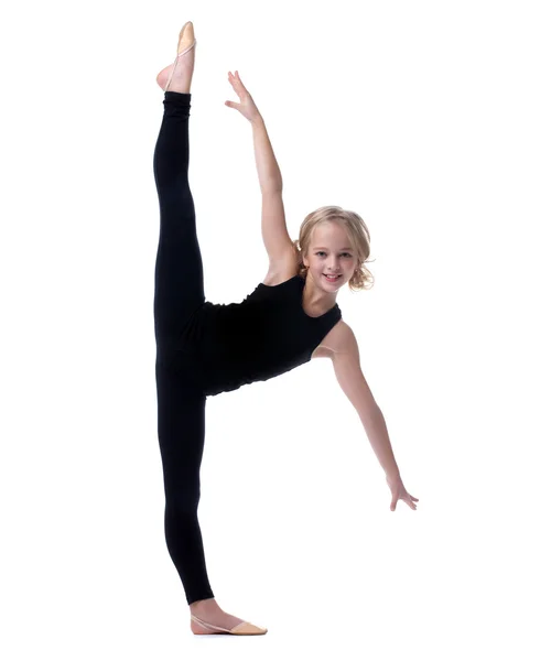 Bild des flexiblen kleinen Mädchens beim vertikalen Split — Stockfoto