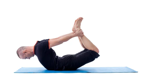 Imagem de yogi flexível posando em asana difícil — Fotografia de Stock