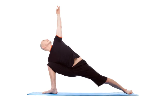 Spirited man practices yoga isolated on white — Stock Photo, Image