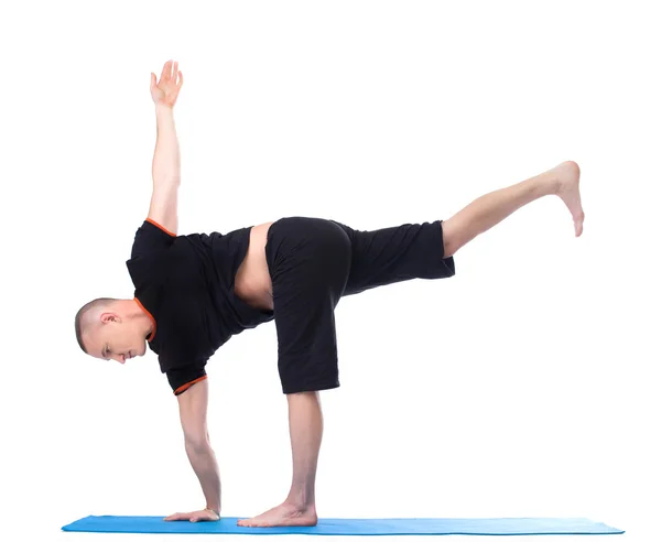 Yoga. Image of middle-aged man posing in studio — Stock Photo, Image