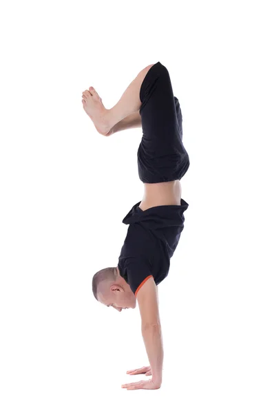 Athletic man doing handstand, isolated on white — Stock Photo, Image