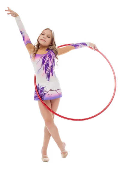 Young artistic athlete performs with hula hoop — Stock Photo, Image